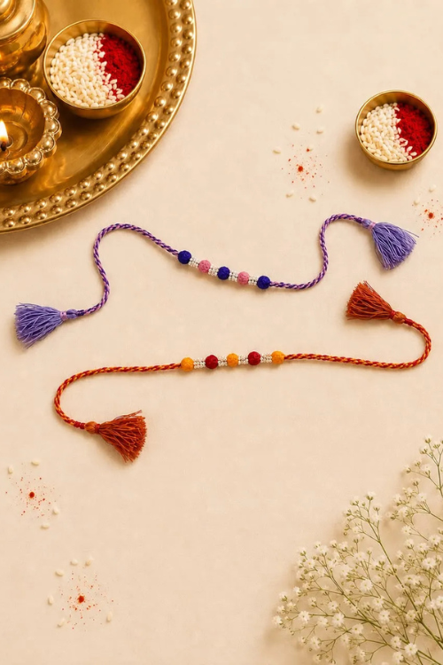 Antarang- Navrang Bead Rakhi- Set Of 2- Blue, Light Pink Rakhi + Maroon, Yellow Rakhi