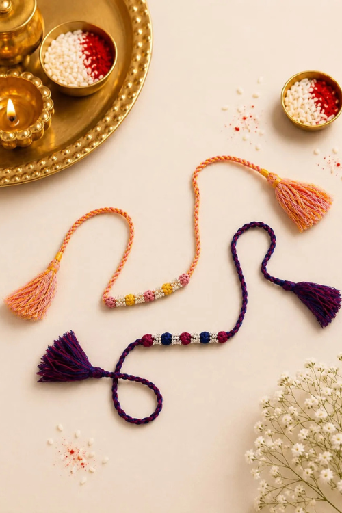 Antarang- Navrang Bead Rakhi- Set Of 2- Light Pink, Yellow Rakhi + Rani Pink, Blue Rakhi
