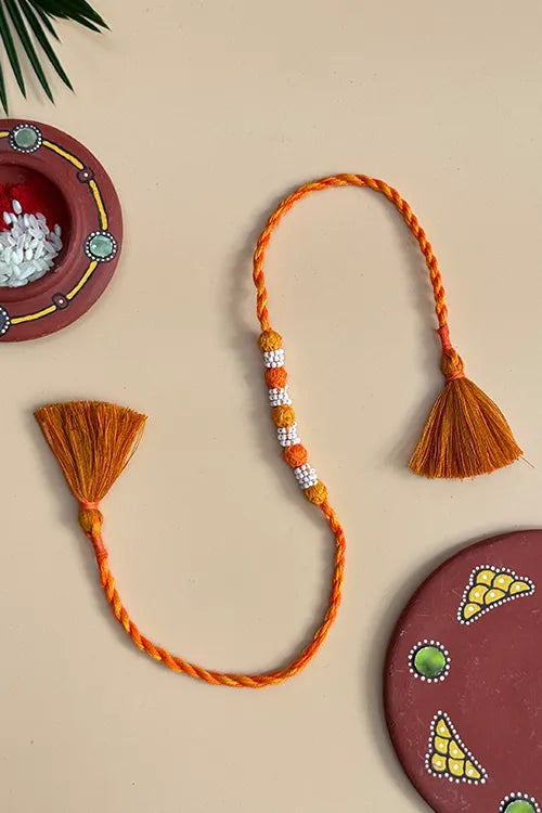 Antarang- Navrang Bead Rakhi- Set Of 2- Orange, Yellow Rakhi + Rani Pink, Purple Rakhi