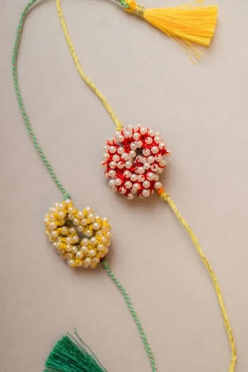 Samoolam Beaded Coral Crochet Rakhi (Set of 2)