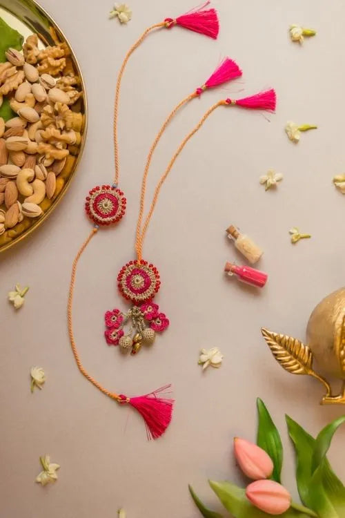 Samoolam Pink Twilight Crochet Rakhi & Lumba Set (Set Of 2)