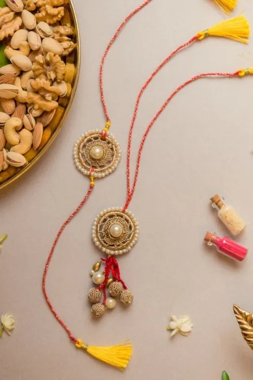 Samoolam Antique Pearl Crochet Rakhi & Lumba Set (Set Of 2)