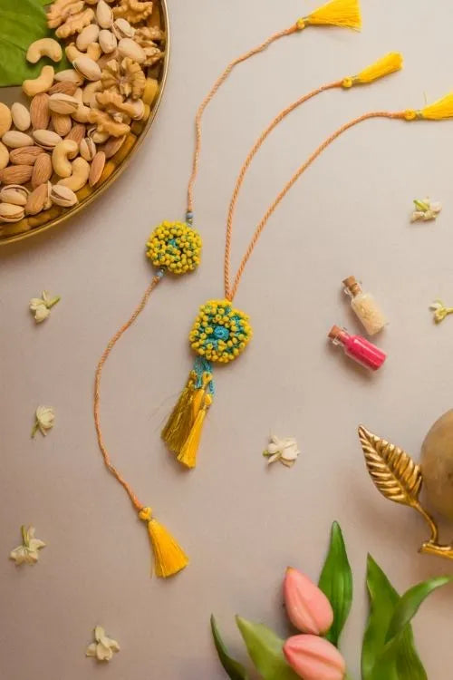 Samoolam Yellow Coral Crochet Rakhi & Lumba Set (Set Of 2)