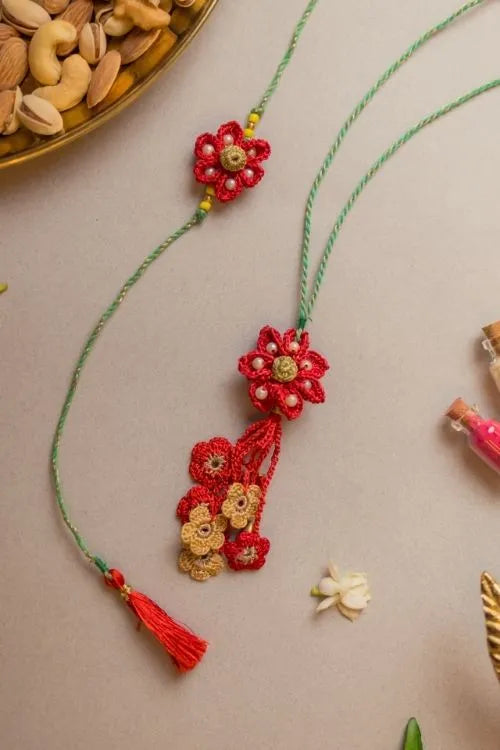 Samoolam Red Flower Crochet Rakhi & Lumba Set (Set Of 2)