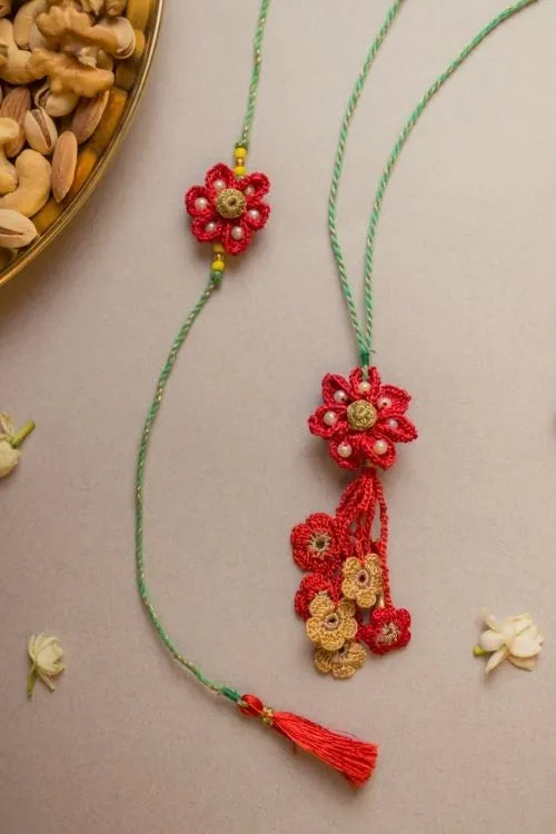 Samoolam Red Flower Crochet Rakhi & Lumba Set (Set Of 2)