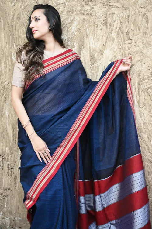 Deccan Elegance. Cotton Blend Self Striped Ilkal Lugdi Saree - Neel Devgiri