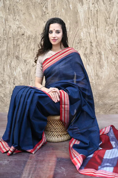 Deccan Elegance. Cotton Blend Self Striped Ilkal Lugdi Saree - Neel Devgiri