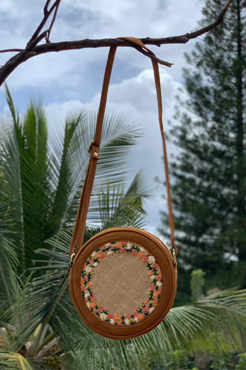 Dhaaga Tan and Floral Round Sling Bag