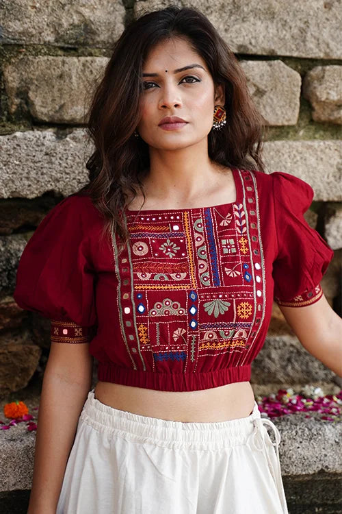 Okhai Raas-Garba brick red pure cotton blouse with hand embroidery and mirror work, styled for Navratri