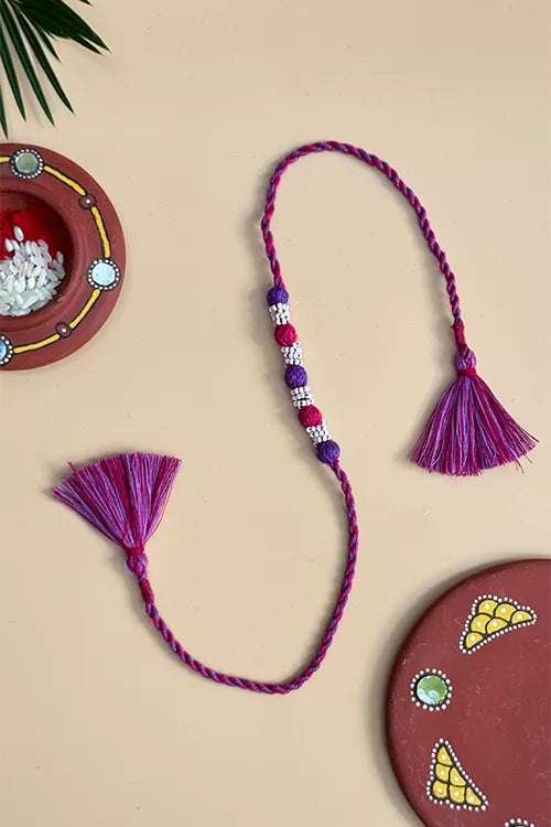 Antarang- Navrang Bead Rakhi- Set Of 2- Orange, Yellow Rakhi + Rani Pink, Purple Rakhi