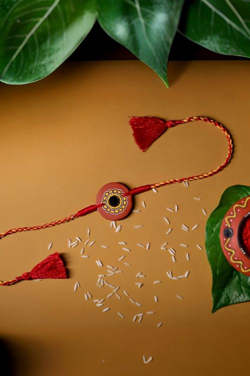 Antarang  (Set Of 2) Terracotta. Antarang-Terracotta.Suraj- Handpainted Terracotta Rakhi Made By Divyang Rural Women