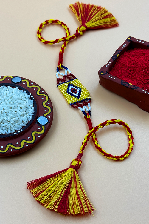Antarang  (Set Of 2)  Traditional Saurastra Beadwork Rakhi, 100% Cotton, Bhai Rakhi. Yellow-Marron. Made By Divyang Rural Women