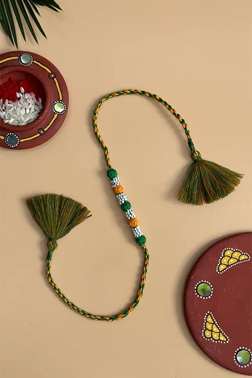 Antarang- Navrang Bead Rakhi- Set Of 2- Green, Yellow Rakhi+ Red, Bright Yellow Rakhi