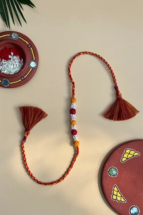 Antarang- Navrang Bead Rakhi- Set Of 2- Blue, Light Pink Rakhi + Maroon, Yellow Rakhi
