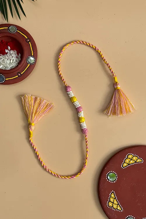 Antarang- Navrang Bead Rakhi- Set Of 2- Light Pink, Yellow Rakhi + Rani Pink, Blue Rakhi