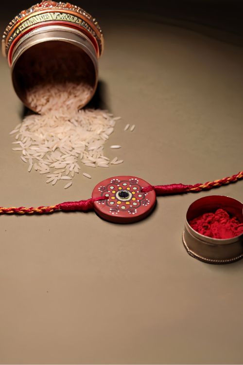 Antarang  (Set Of 2) Terracotta. Antarang-Terracotta. Dharti- Handpainted Terracotta Rakhi Made By Divyang Rural Women