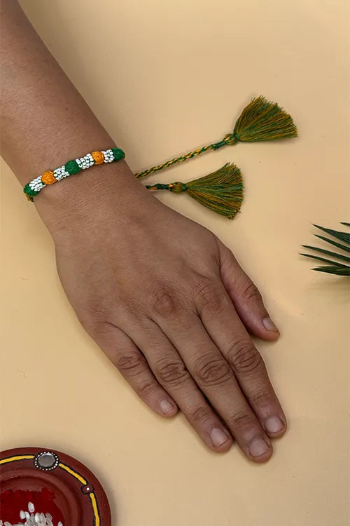 Antarang- Navrang Bead Rakhi- Set Of 2- Green, Yellow Rakhi+ Red, Bright Yellow Rakhi