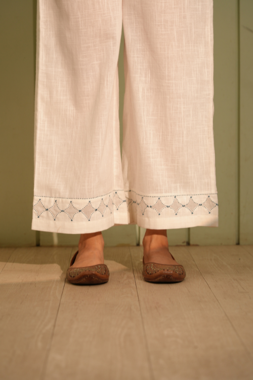 Rangsutra Dhwani White Flared Cotton Pant With Applique