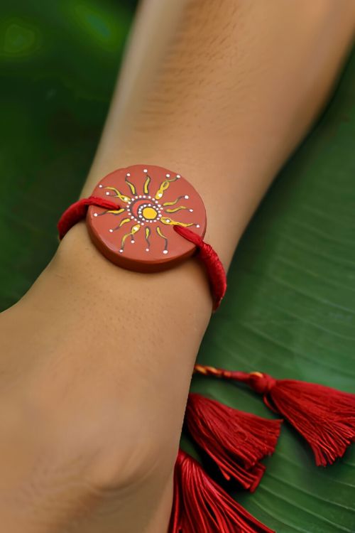 Antarang  (Set Of 2) Terracotta. Antarang-Terracotta. Suraj- Chanda- Handpainted Terracota Rakhi. Made By Divyang Rural Women