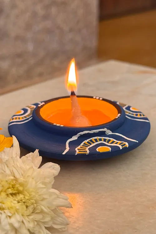 Antarang: Terracotta- Handpainted - Blue Bloom Disc Diya Set Of 8