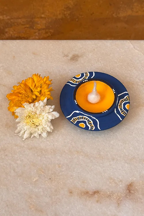 Antarang: Terracotta- Handpainted - Blue Bloom Disc Diya Set Of 8
