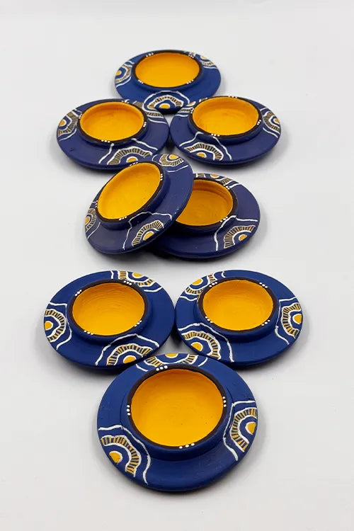 Antarang: Terracotta- Handpainted - Blue Bloom Disc Diya Set Of 8