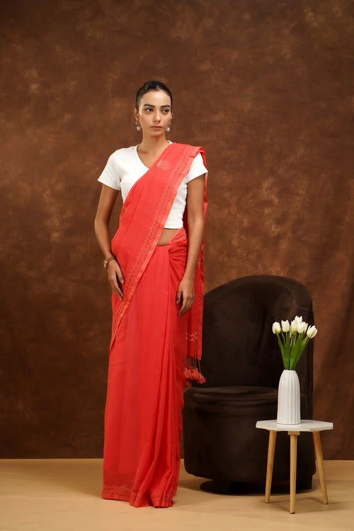 Shwet Women Coral Pink Hand Embroidered Chikankari  Mulmul Saree