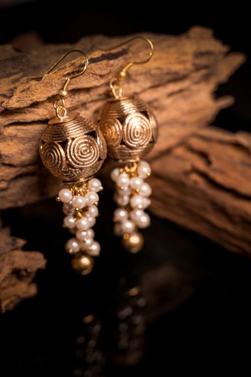 Miharu Gold Tone Dokra Jhumki Earrings With Pearls