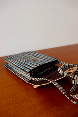 Kirgiti's Multi Striped Dabu Printed And Vegan Leather Flapped Hand Bag Cum Sling