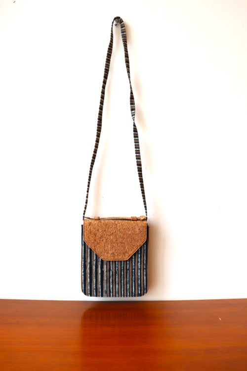 Kirgiti's Multi Striped Dabu Printed And Vegan Leather Flapped Hand Bag Cum Sling
