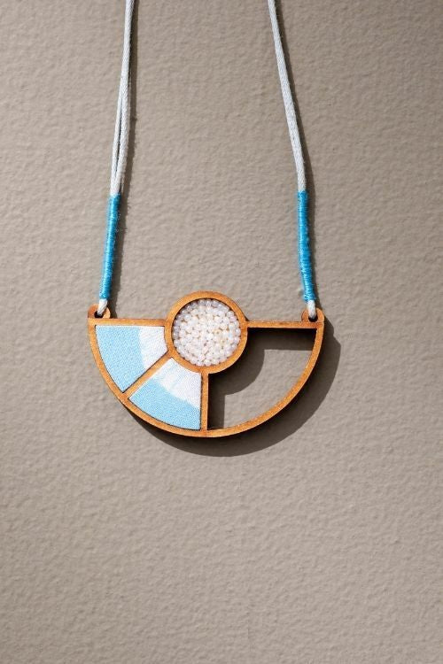 Whe Blue And White Geometrical Repurposed Fabric And Wood Adjustable Pendant Necklace