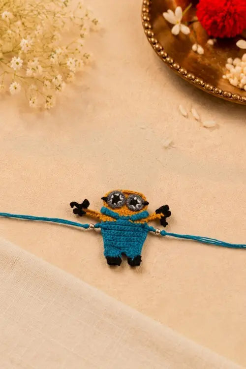 WHE Handmade Crochet Minion Rakhi