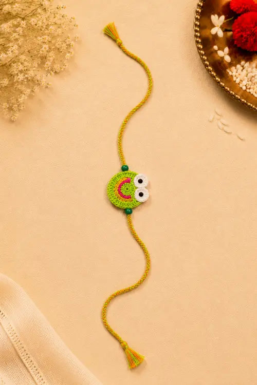 WHE Handmade Crochet Smiley Face Rakhi