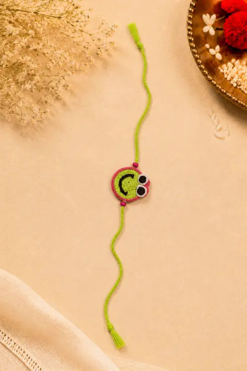WHE Handmade Crochet Smiley Face Rakhi