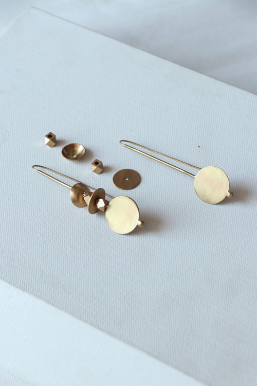 Lukka Chuppi Symmetry Drop earrings with brass off cut sheet.