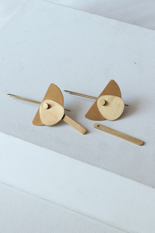 Lukka Chuppi Eterna balanced earrings with brass off cut sheet.