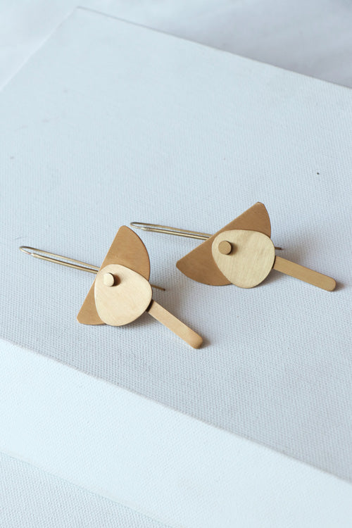 Lukka Chuppi Eterna balanced earrings with brass off cut sheet.