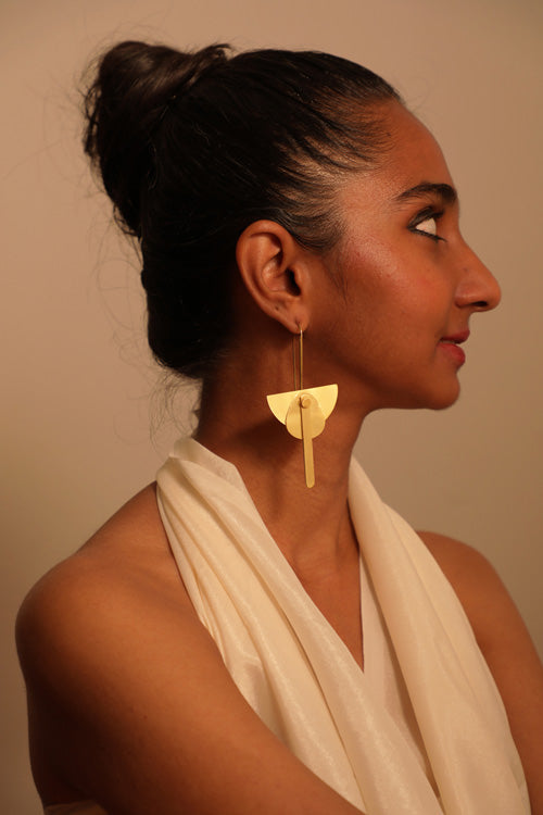 Lukka Chuppi Eterna balanced earrings with brass off cut sheet.