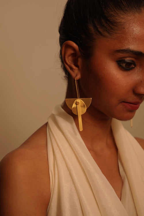 Lukka Chuppi Eterna balanced earrings with brass off cut sheet.