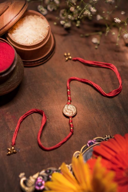 Miharu Cotton Handwoven Dokra  Rakhi -Red