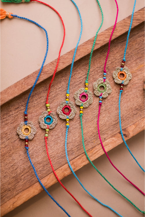 Samoolam Multicolor Golden Flower Rakhi (Set Of 6)