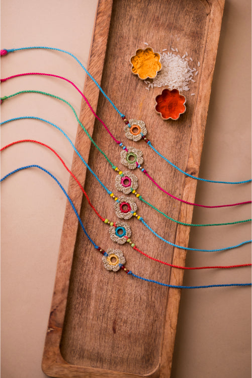 Samoolam Multicolor Golden Flower Rakhi (Set Of 6)