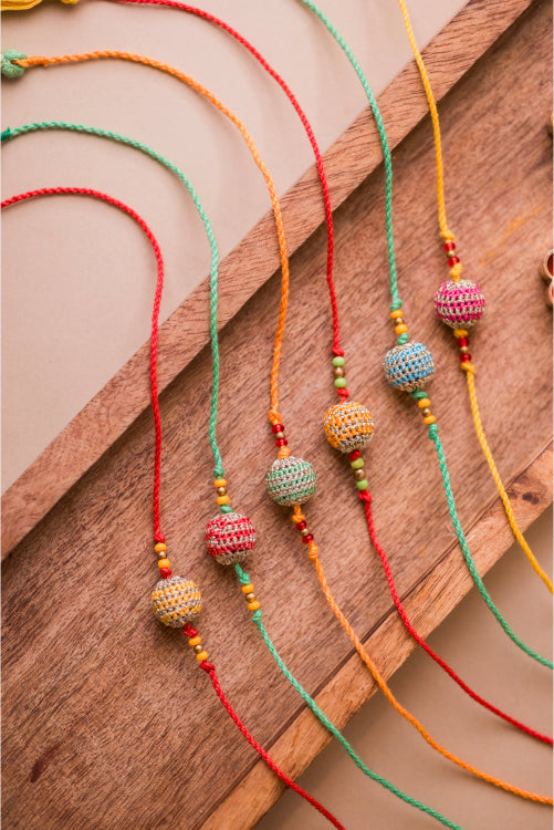 Samoolam Multicolour Lined Suraj Rakhi (Set Of 6)