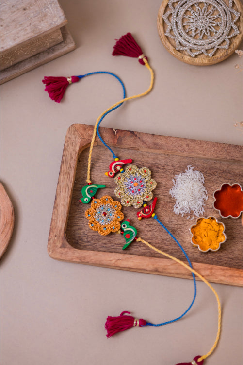 Samoolam Flower With Birds Kids Rakhi (Set Of 2)