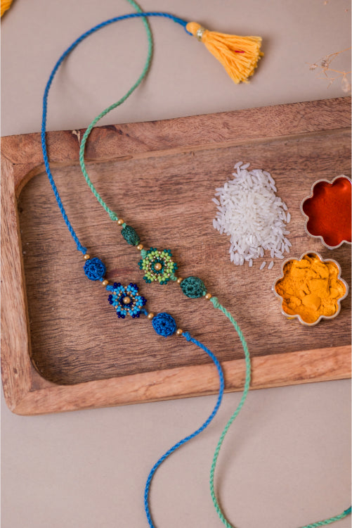 Samoolam Blue & Green Beads Flower Rakhi (Set Of 2)