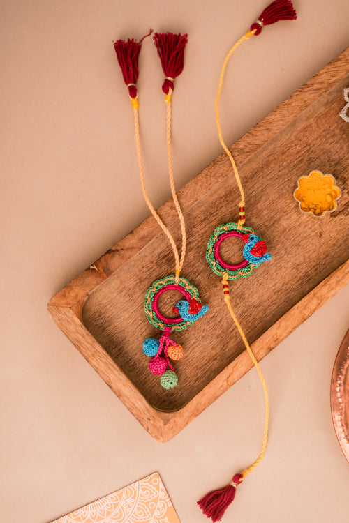 Samoolam Sonchidiya Rakhi & Lumba (Set Of 2)