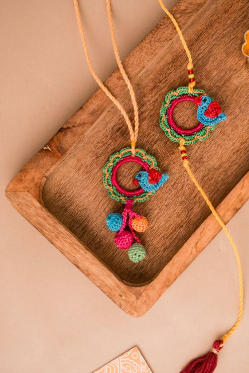 Samoolam Sonchidiya Rakhi & Lumba (Set Of 2)