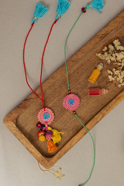 Samoolam Rakhi & Lumba Set Poppy (Set Of 2)