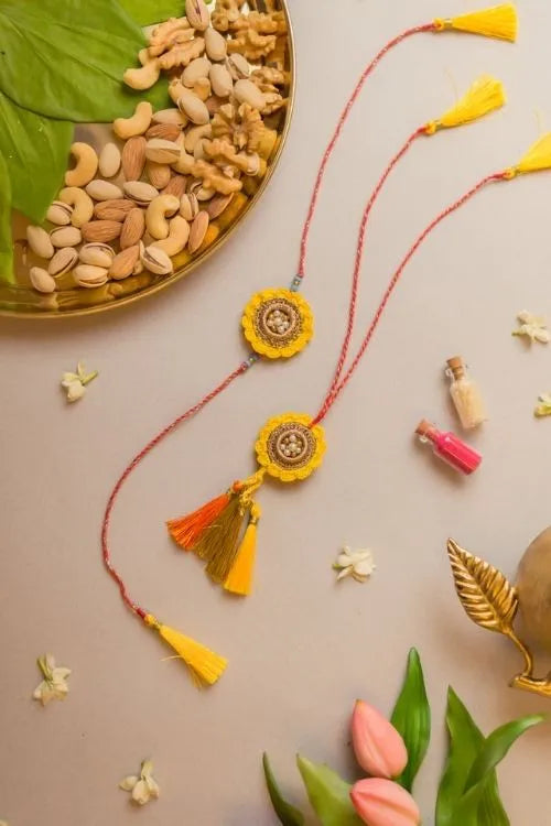 Samoolam Marigold Crochet Rakhi & Lumba Set (Set Of 2)