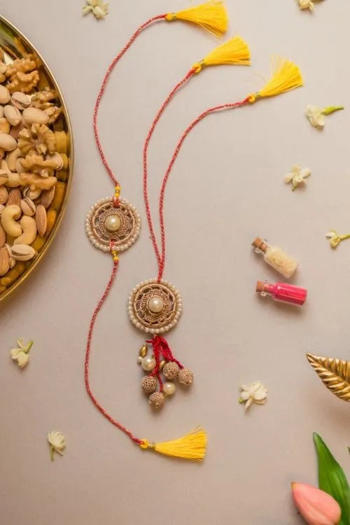 Samoolam Antique Pearl Crochet Rakhi & Lumba Set (Set Of 2)